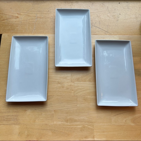 Perfect rectangles. Classic white plates by Crate + Barrel. A hostess staple. - Picture 2 of 3